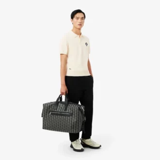 「Made in France」バッジをあしらったポロシャツカラーセーター