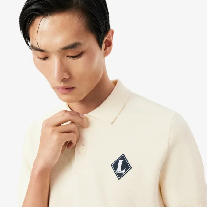 「Made in France」バッジをあしらったポロシャツカラーセーター 「Made in France」バッジをあしらったポロシャツカラーセーター