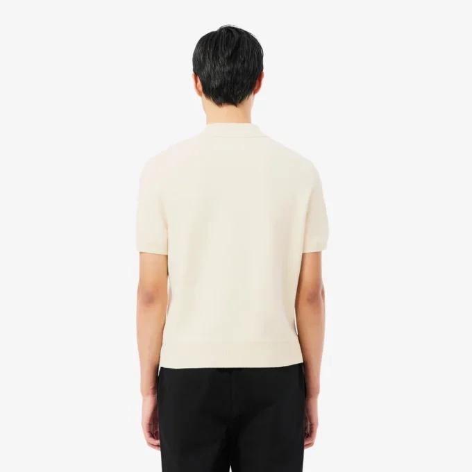「Made in France」バッジをあしらったポロシャツカラーセーター 「Made in France」バッジをあしらったポロシャツカラーセーター