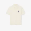 「Made in France」バッジをあしらったポロシャツカラーセーター 「Made in France」バッジをあしらったポロシャツカラーセーター