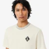 「Made in France」バッジをあしらったTシャツ 「Made in France」バッジをあしらったTシャツ