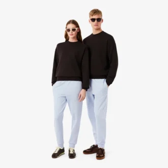 エンボス加工のロゴ入りスウェットパンツ