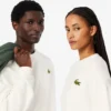 ユニセックス ルーズフィット バッジアクセント フリーススウェット ユニセックス ルーズフィット バッジアクセント フリーススウェット