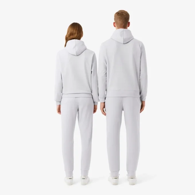 エンボス加工のロゴ入りスウェットパンツ
