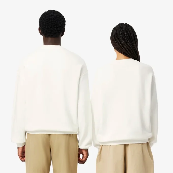 ユニセックス ルーズフィット バッジアクセント フリーススウェット ユニセックス ルーズフィット バッジアクセント フリーススウェット
