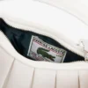 クラシックフィットのエンボス加工ロゴ入りポロシャツ クラシックフィットのエンボス加工ロゴ入りポロシャツ