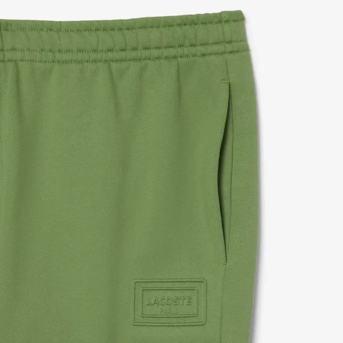 エンボス加工のロゴ入りスウェットパンツ