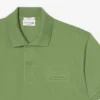 クラシックフィットのエンボス加工ロゴ入りポロシャツ クラシックフィットのエンボス加工ロゴ入りポロシャツ