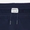 エンボス加工のロゴ入りスウェットパンツ