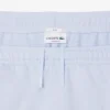 エンボス加工のロゴ入りスウェットパンツ