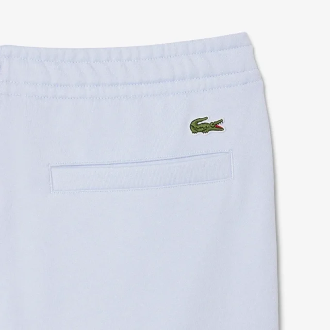 エンボス加工のロゴ入りスウェットパンツ