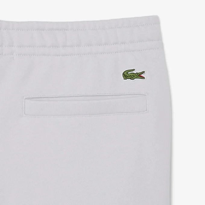 エンボス加工のロゴ入りスウェットパンツ