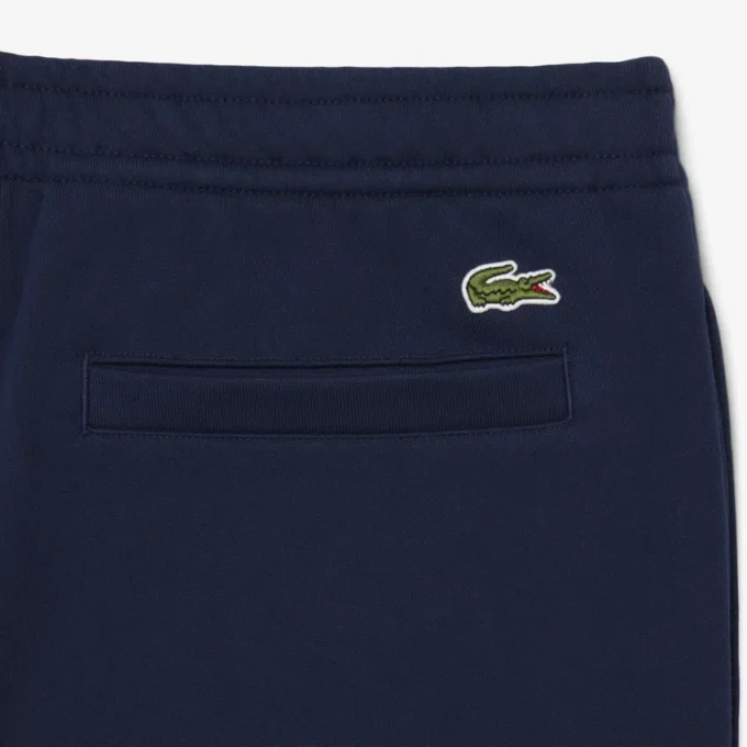 エンボス加工のロゴ入りスウェットパンツ
