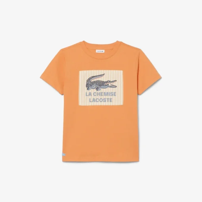 バッジがアクセントのコットンTシャツ