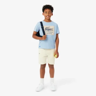 バッジがアクセントのコットンTシャツ