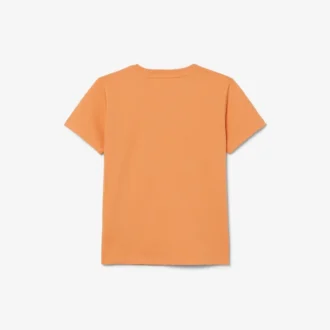 バッジがアクセントのコットンTシャツ