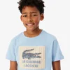 バッジがアクセントのコットンTシャツ