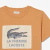 バッジがアクセントのコットンTシャツ