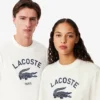 ユニセックス シグネチャープリント コットンTシャツ ユニセックス シグネチャープリント コットンTシャツ