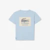 バッジがアクセントのコットンTシャツ