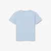 バッジがアクセントのコットンTシャツ